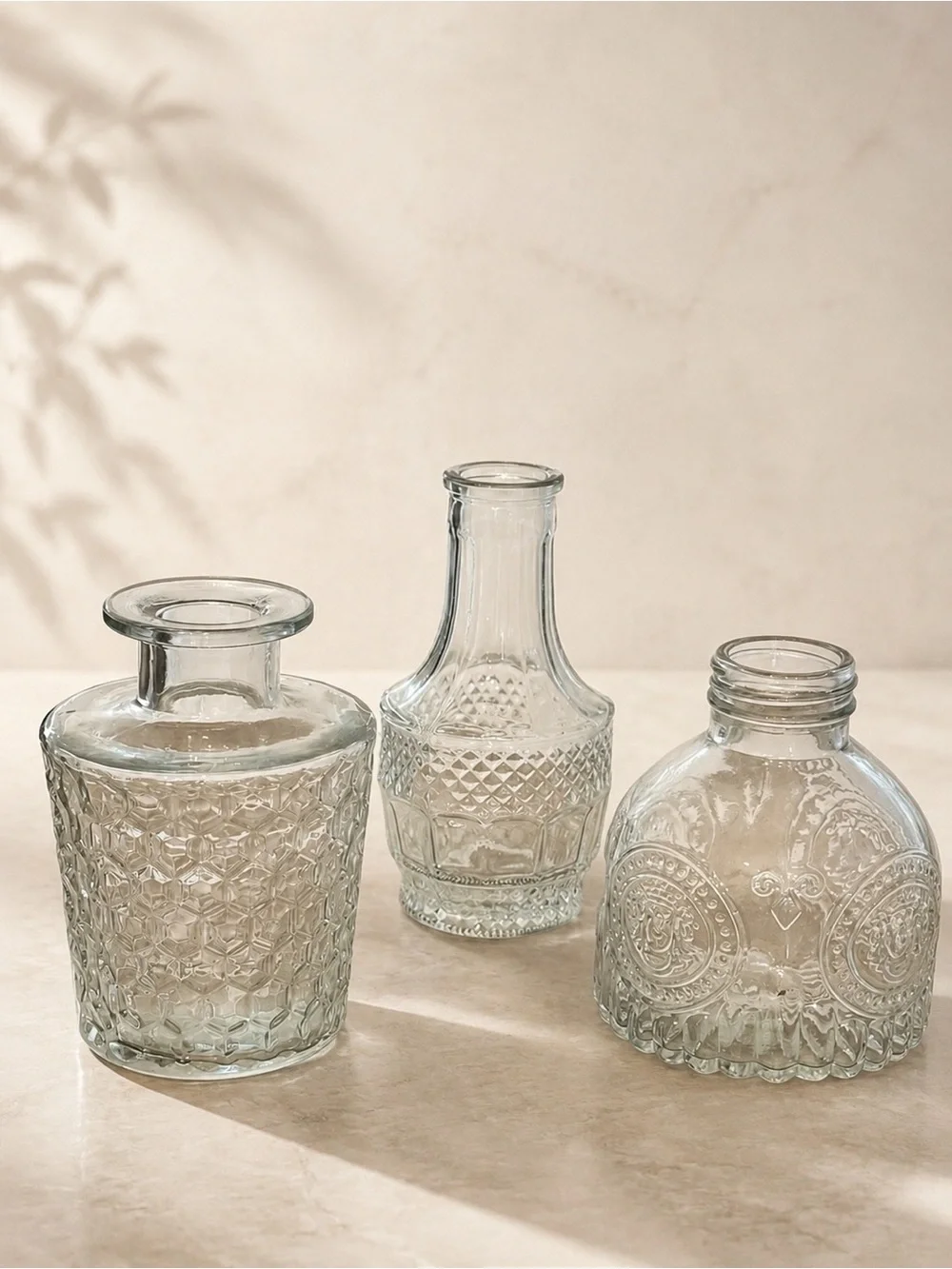 Vintage 1980s Clear Glass Decorative Bottles Set of 3 Embossed Bud Vases